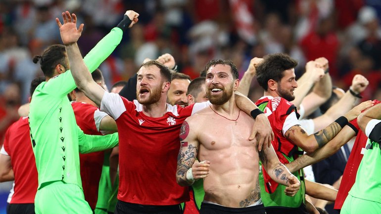    Футболисты сборной Грузии после победы над Португалией. Reuters