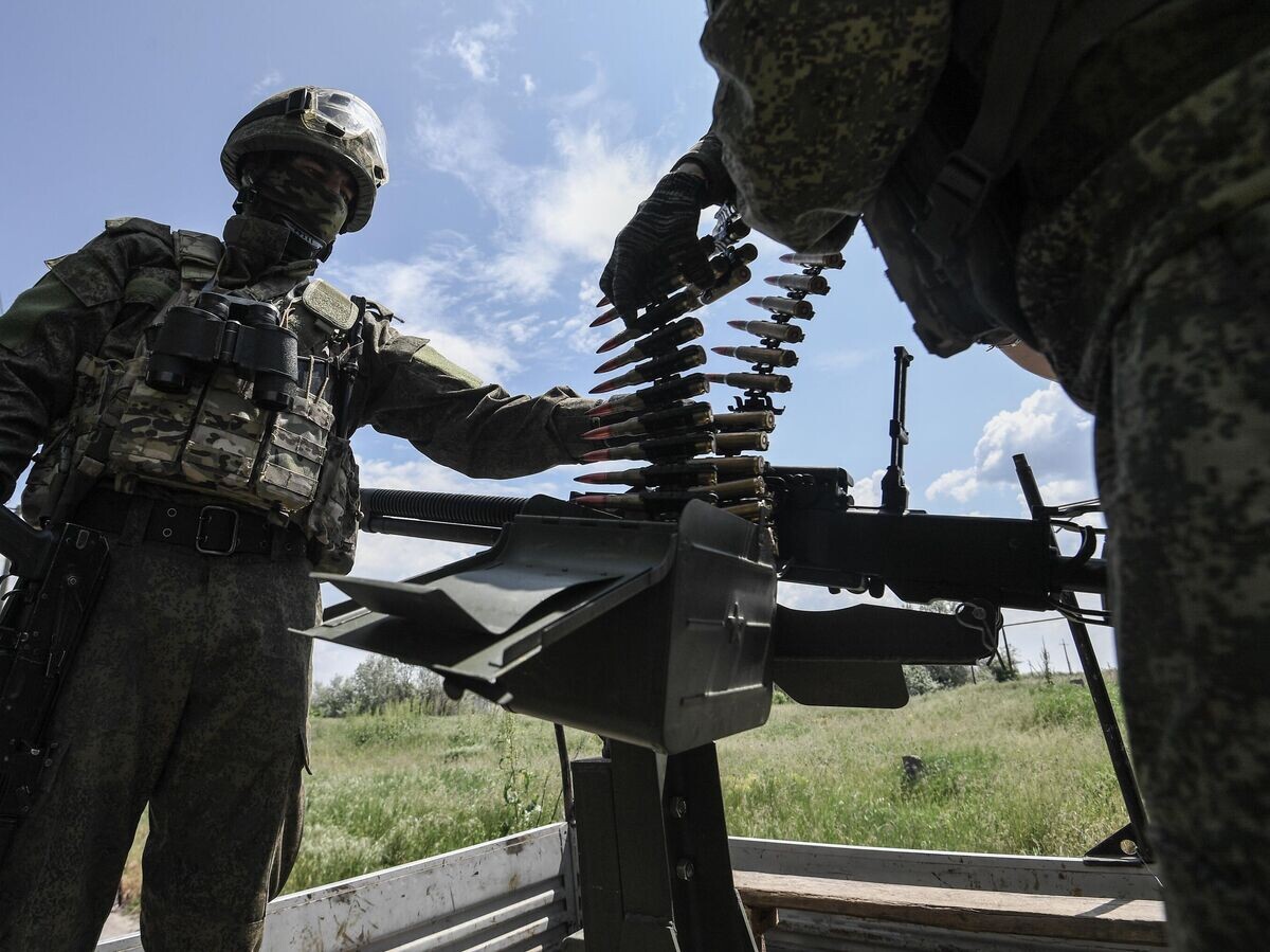    Зенитный расчет мобильной группы быстрого реагирования, вооруженный пулемётом ДШК© РИА Новости / Константин Михальчевский