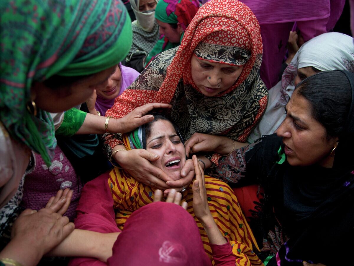    Люди на религиозном празднике в городе Раджамандри в штате Андхра Прадеш на юго-восточном побережье Индии© AP Photo / Dar Yasin