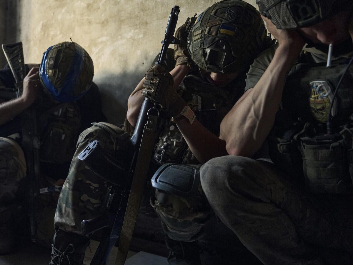    Украинские военнослужащие© AP Photo / Libkos
