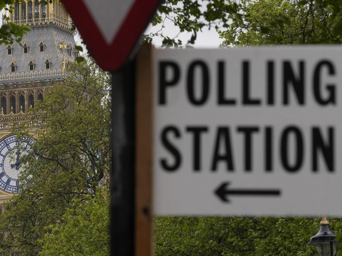    Выборы в Британии© AP Photo / Kin Cheung