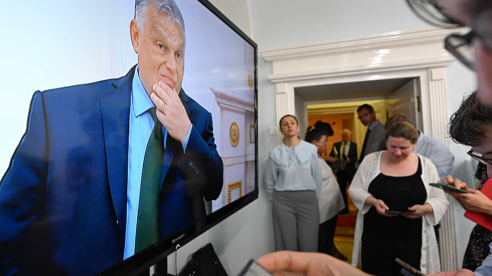 Фото: Дмитрий Азаров / Коммерсантъ📷Виктор Орбан (на экране)