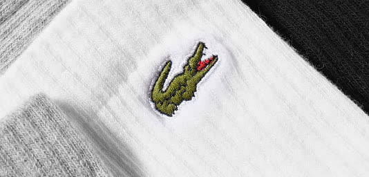 Логотип LACOSTE