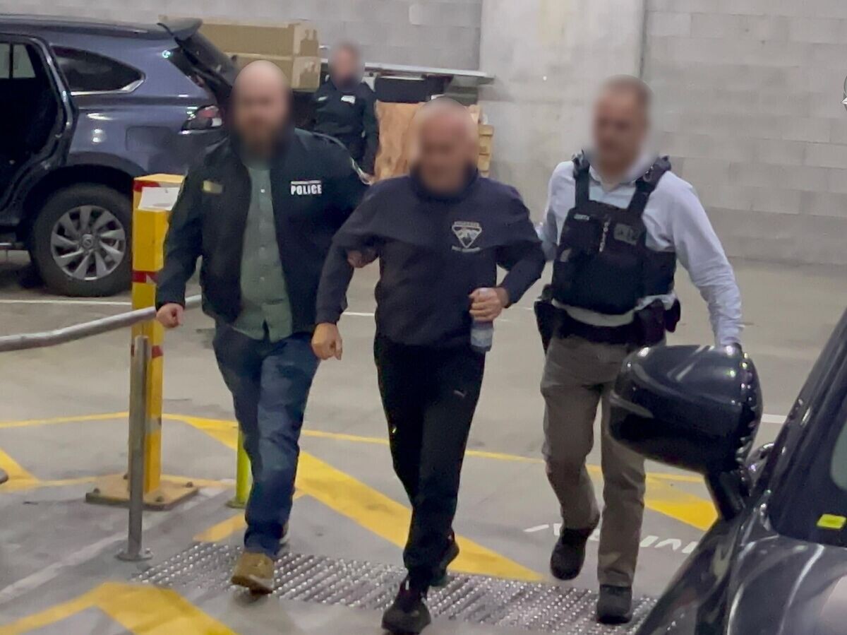    Задержание подозреваемого в шпионаже в Австралии© Фото : Australian Federal Police