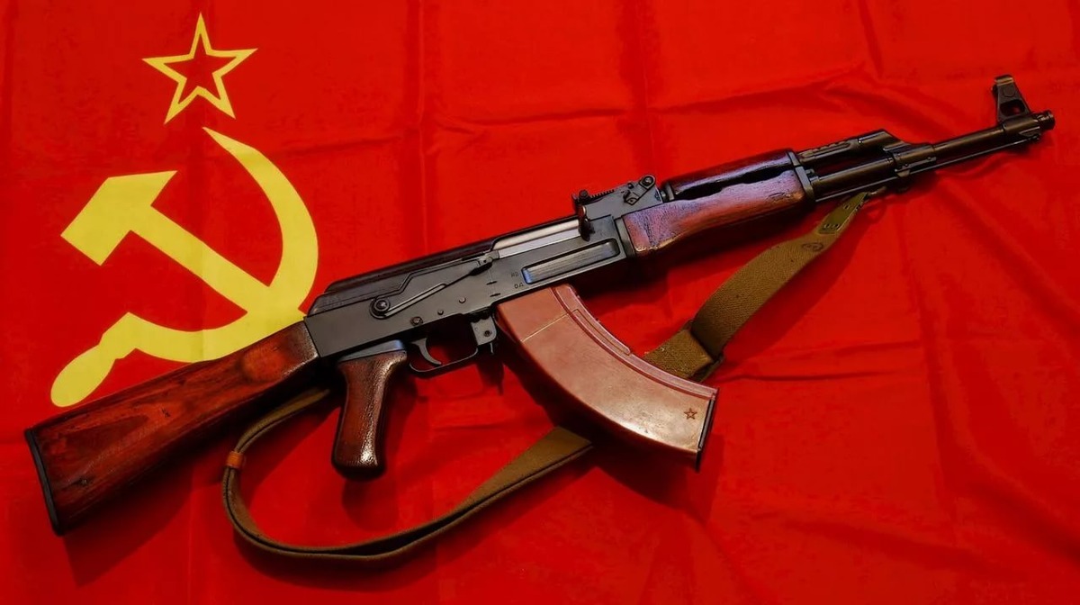 АК