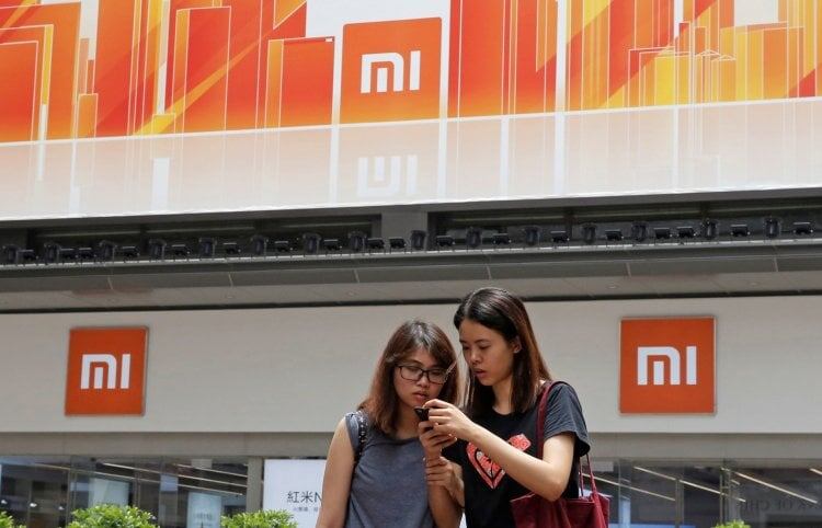    СМИ сообщают о массовом сбое Xiaomi, но мы выяснили, что это — фейк. Фото: © AP Photo / Kin Cheung