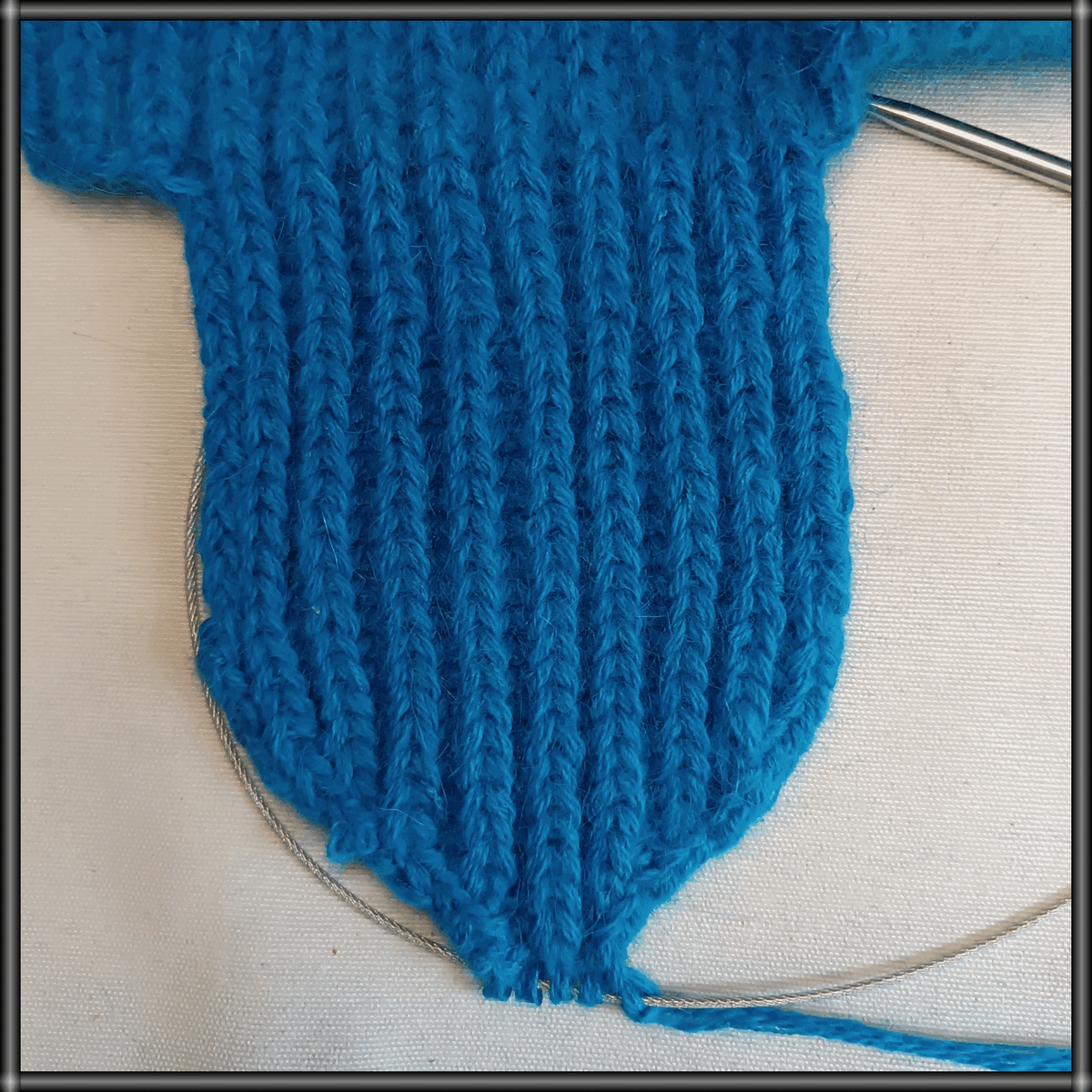 Ухо с убавлениями петель