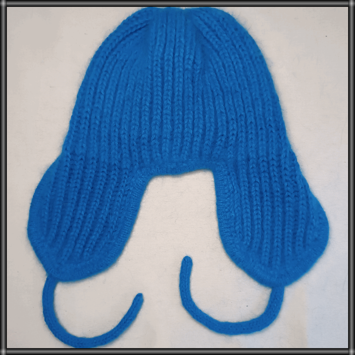 Задняя сторона шапки