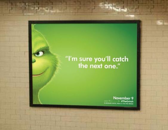 На этом наружном постере Гринч ехидно подмигивает, подбадривая прохожих фразой: «Уверен, в следующий раз у вас получится!» 