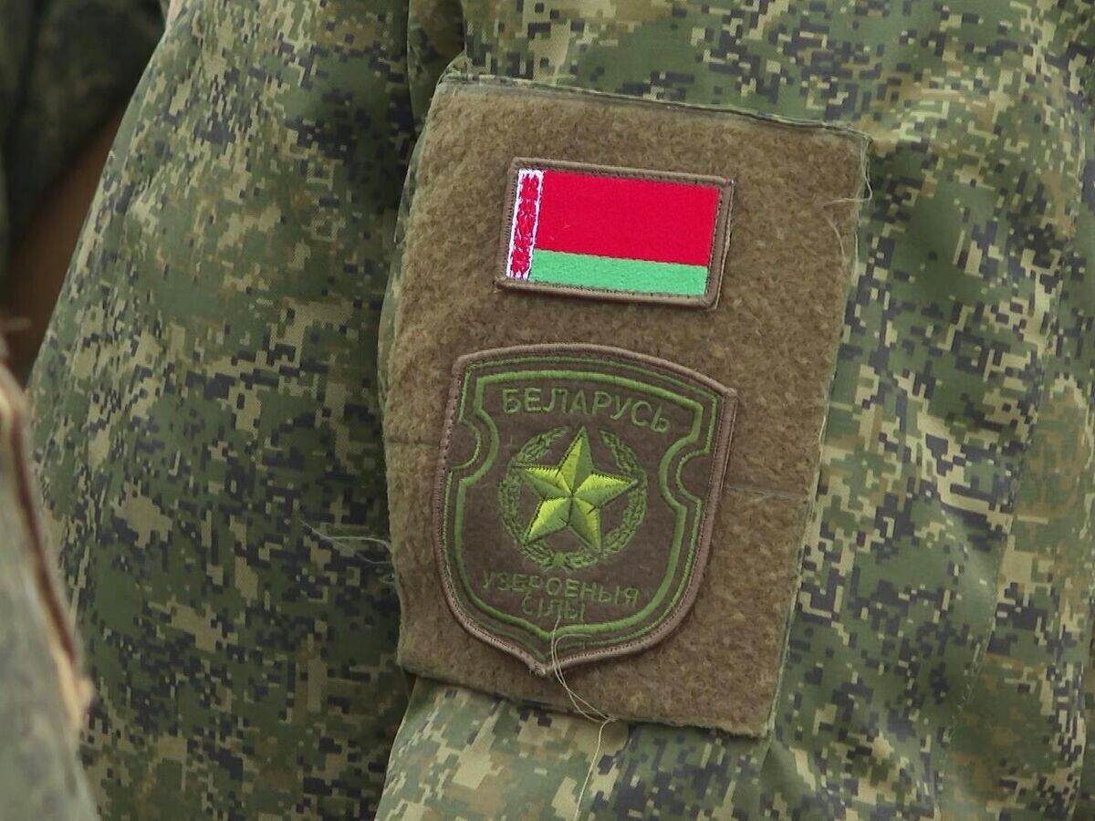    Шеврон на форме белорусского военнослужащего© РИА Новости / Пресс-служба Минобороны РФ