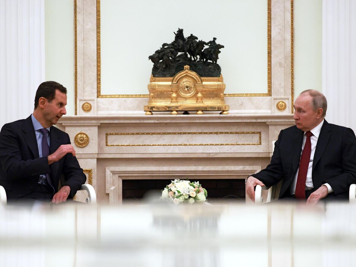    Президент РФ Владимир Путин и президент Сирии Башар Асад во время встречи© РИА Новости / POOL