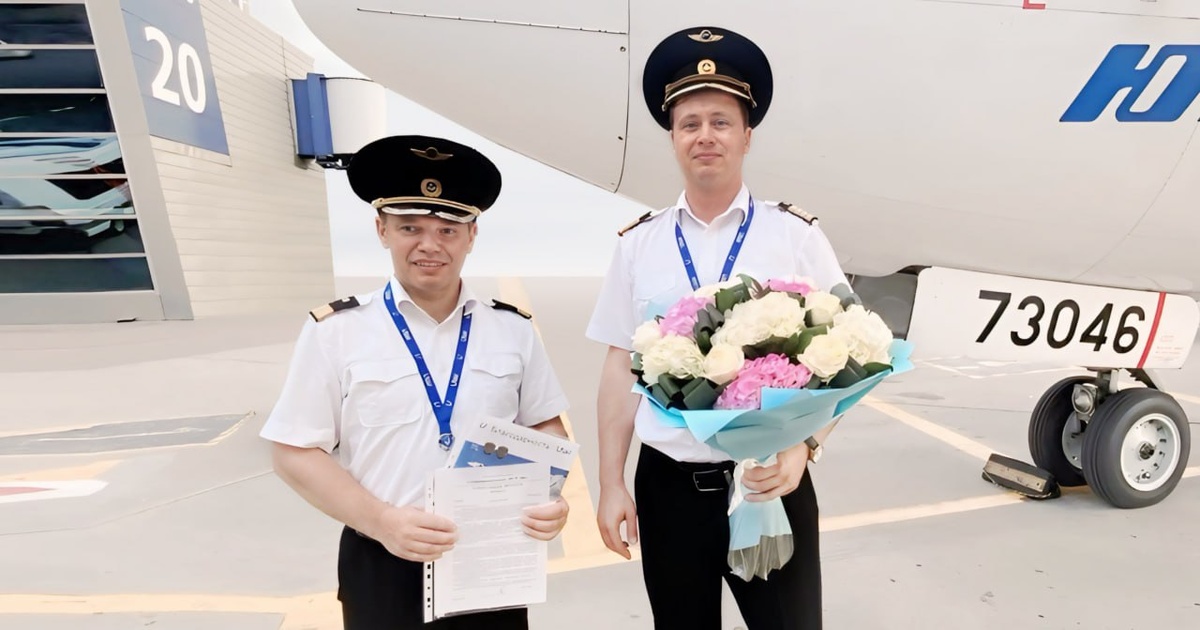 Дмитрий Лукянинко (справа) и командир лётного отряда №9 Эдуард Гладких