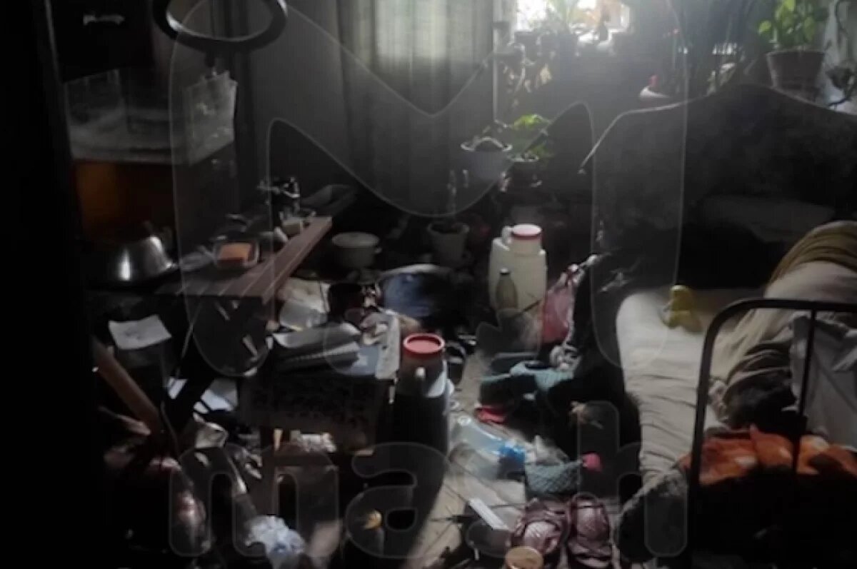    Кадр из квартиры, где умерли сёстры.