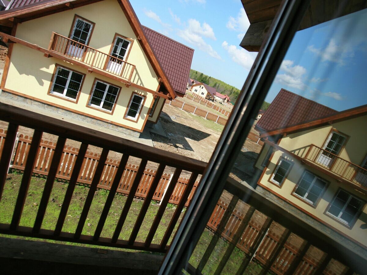    Строительство коттеджей © РИА Новости / Руслан Кривобок