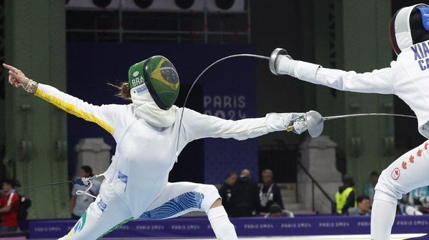    Натали Мелльхаузен (Бразилия) и Сяо Жуйэнь (Канада). Reuters