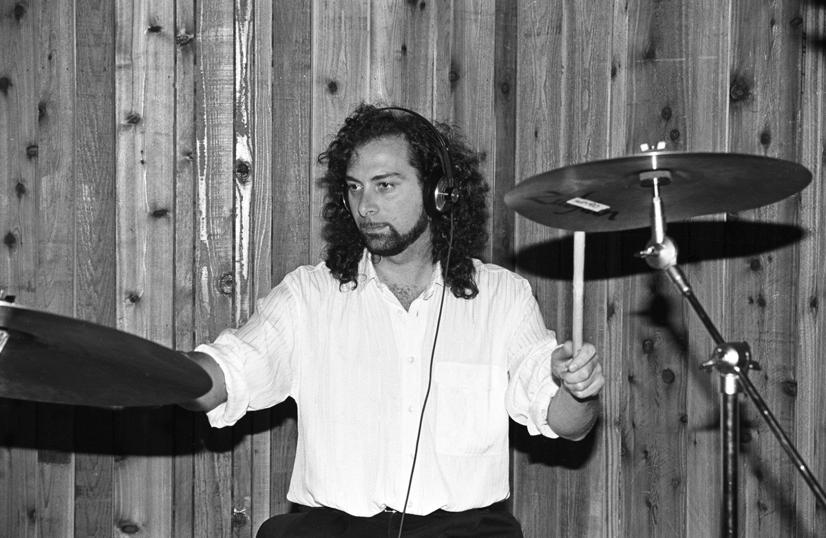 Record producer and former drummer with Prince and The Revolution Bobby Z (aka Bobby Rivkin) drums during a recording session in Minneapolis