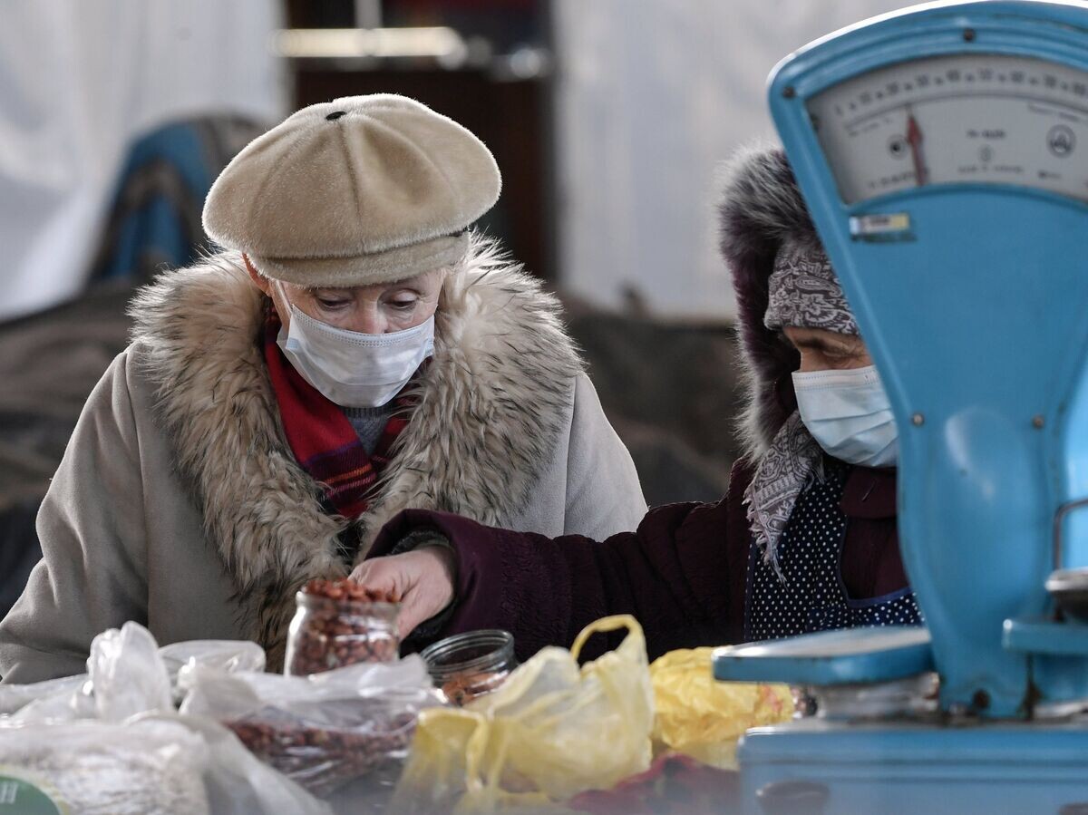    Женщина в магазине в Симферополе© РИА Новости . Константин Михальчевский