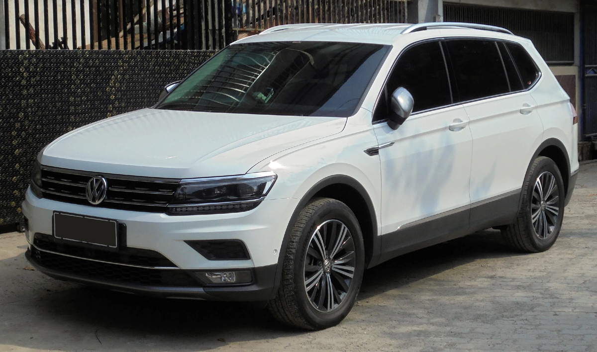 Tiguan 2019 года и Chery Tiggo 7 2024 года