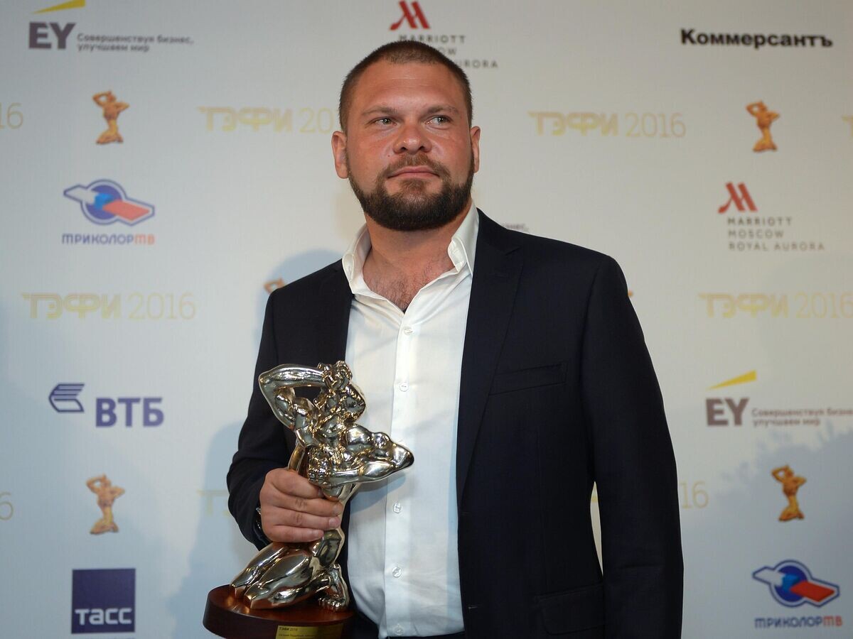    Лауреат российской телевизионной премии "ТЭФИ 2016" в номинации "Репортер/оператор репортажа" (проект "Освобождение Пальмиры") тележурналист ВГТРК Евгений Поддубный после церемонии награждения© РИА Новости / Евгения Новоженина