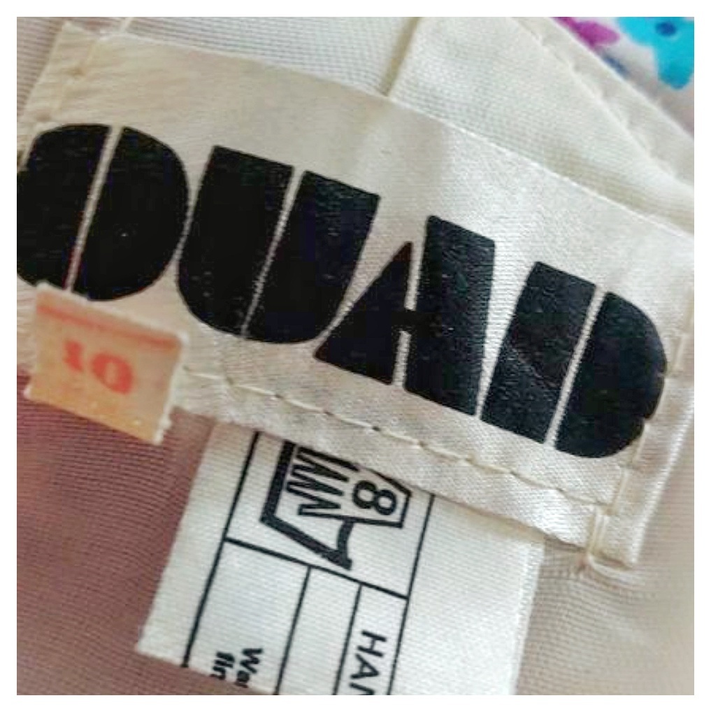 Бирка Quad у платья из личной коллекции