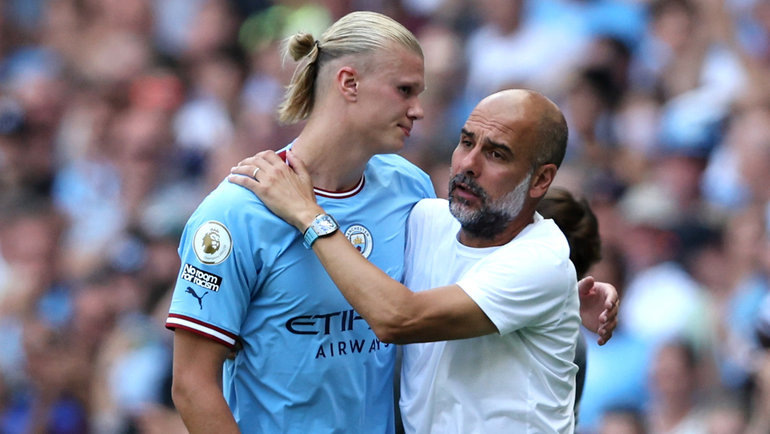    Эрлинг Холанн и Хосеп Гвардиола. Getty Images