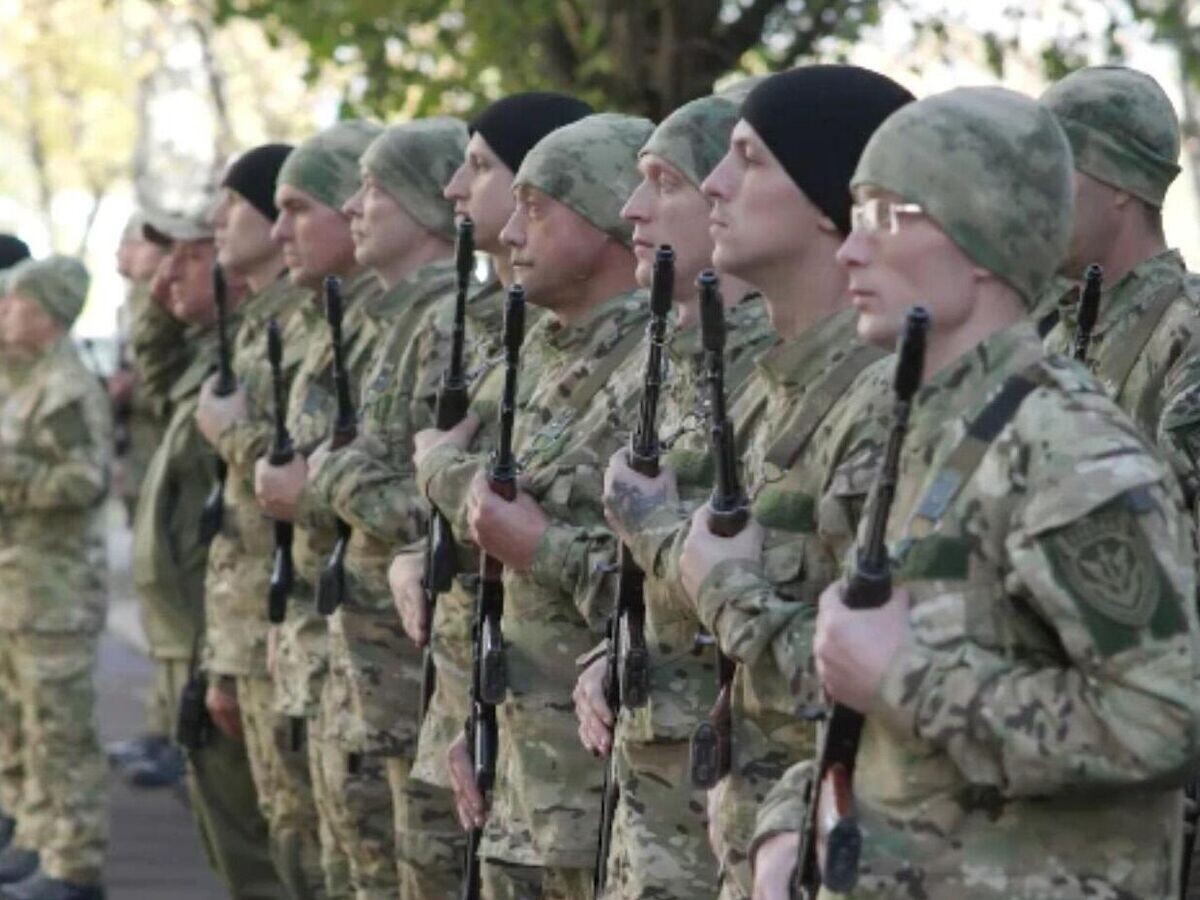    Бойцы батальона имени Богдана Хмельницкого, первого подразделения, состоящего из бывших украинских военнопленных, принесли присягу России© РИА Новости