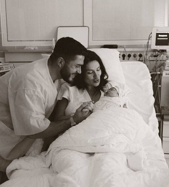 Татьяна Мусульбес и Роман Капаклы с дочерью