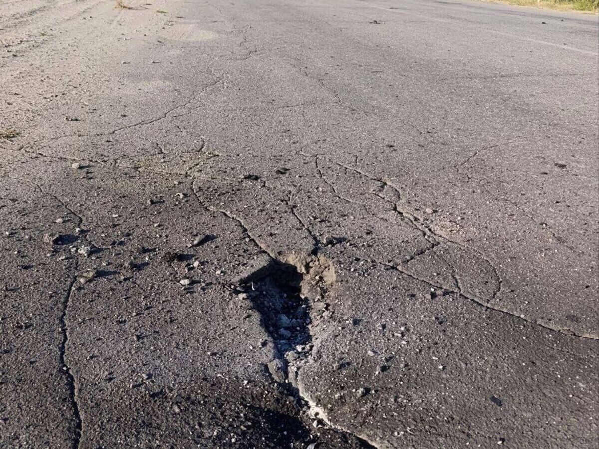    Последствия атаки дроном маршрута персонала Запорожской АЭС со стороны ВСУ © Фото : ЗАЭС. Официально/Telegram