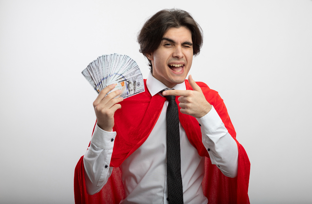 <a href="https://ru.freepik.com/free-photo/joyful-young-superhero-guy-wearing-tie-holding-points-cash-isolated-white_12698781.htm#from_view=detail_alsolike">Изображение от stockking на Freepik</a>