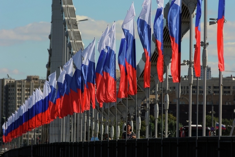  Ни один государственный праздник не обходится без флага России   © РИА Новости. Виталий Белоусов