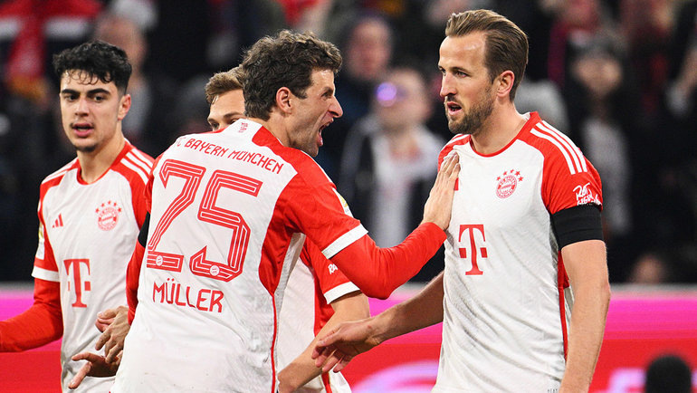    Томас Мюллер и Харри Кейн. Getty Images