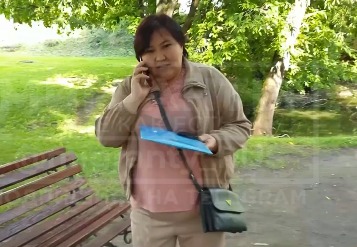 Венера решает вопросы. Фото: скрин видео тг-канала "Мигранты - всё как есть". 