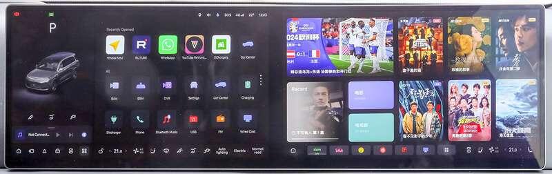    От обилия возможностей медиацентра кружится голова. На нашей машине не было русификации, но она возможна. На нижней линейке – горячие функции вроде открытия порта зарядки.