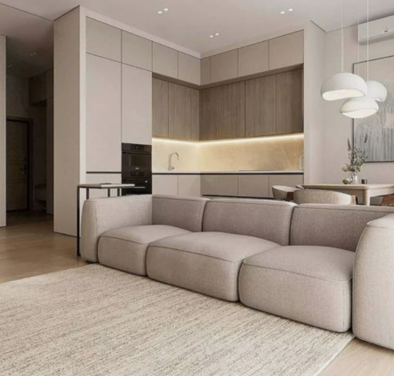 Пастельные цвета, много свободного пространства, закрытая кухня. 