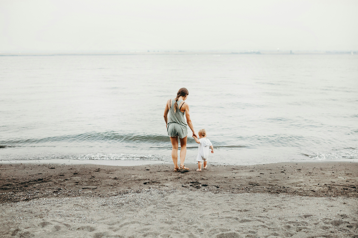 Photo by <a href="https://unsplash.com/@lianamikah?utm_content=creditCopyText&utm_medium=referral&utm_source=unsplash">Liana Mikah</a> on <a href="https://unsplash.com/photos/woman-and-baby-walking-on-gray-sand-seashore-during-daytime-J5DIOISkDko?utm_content=creditCopyText&utm_medium=referral&utm_source=unsplash">Unsplash</a>   