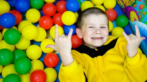 The child is bored and his mother gets him a pool with balls