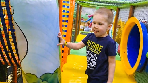 A child runs through a maze on a playground