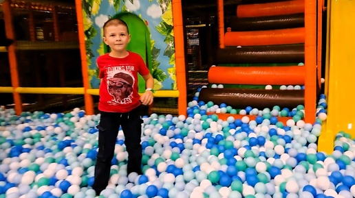 Children's playground, jumping on a trampoline, running through the maze