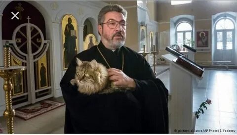 Батюшка с котом