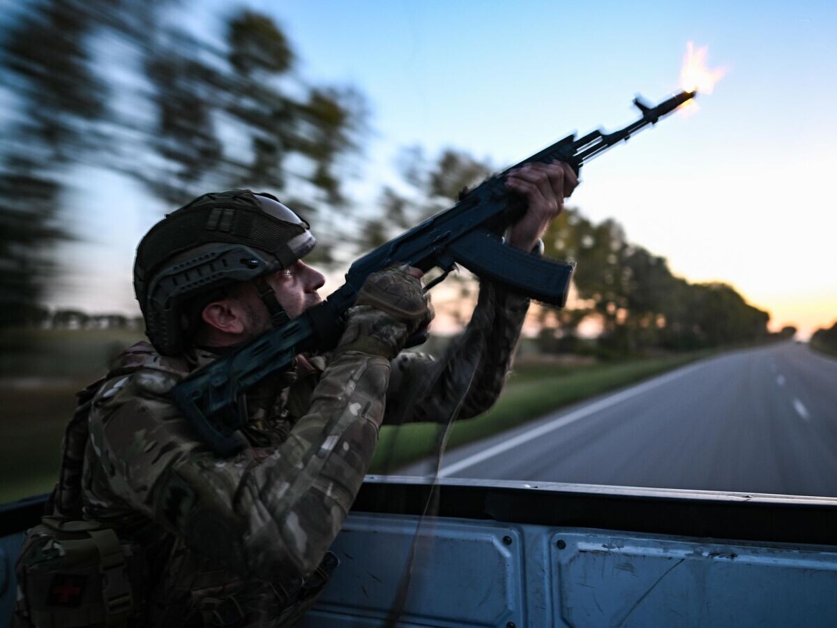    Военнослужащий снайперской группы Аида спецназа "Ахмат" © РИА Новости / Сергей Бобылев