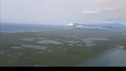 Полет на вертолёте над южной оконечностью Камчатки и посадка на острове Парамушир