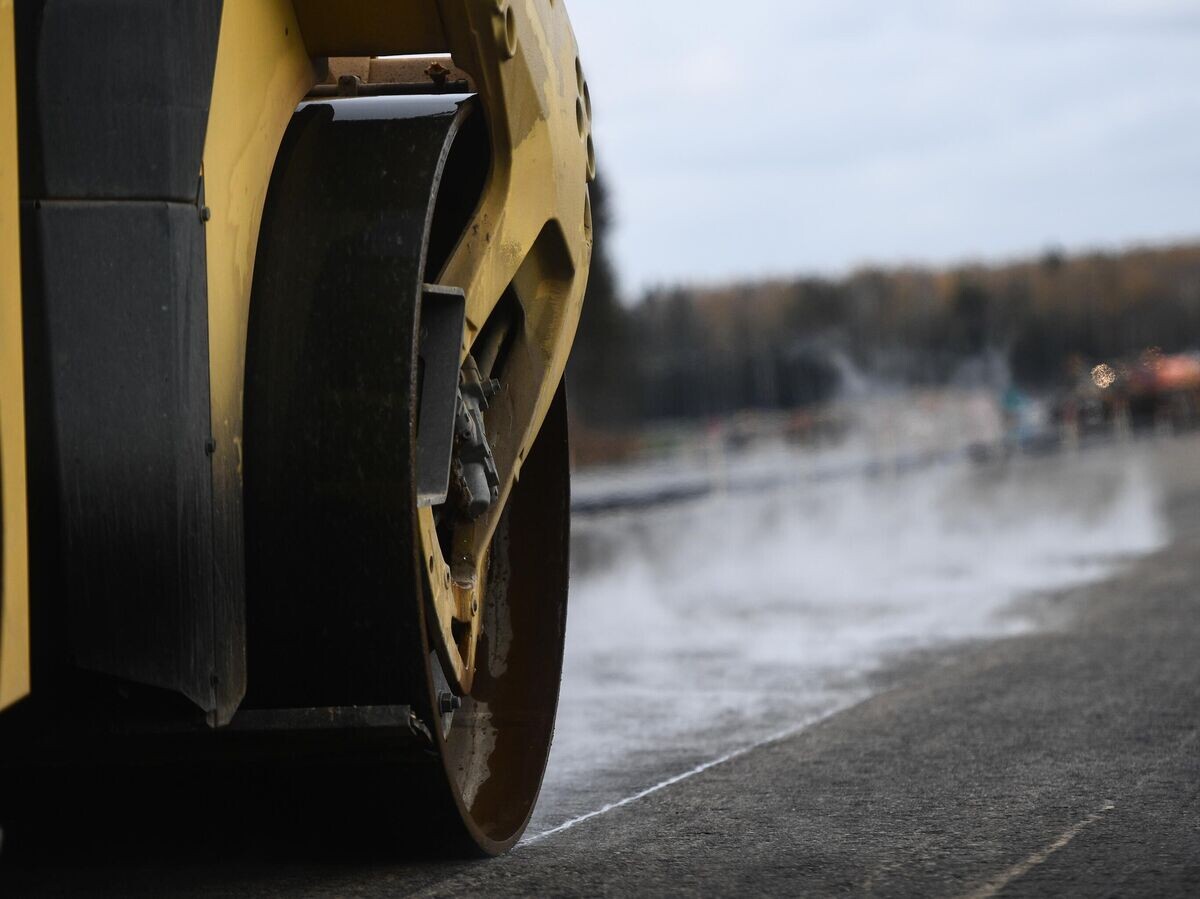    Строительство автодороги© РИА Новости / Евгений Одиноков