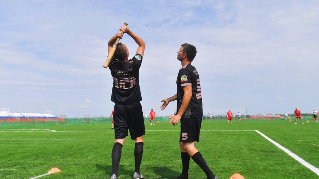    Во время игры в лапту.   РИА "Новости"