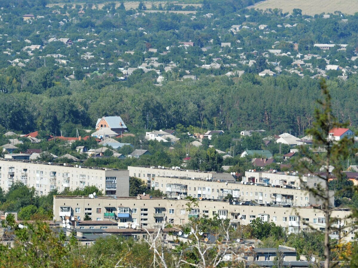    Вид на жилые кварталы в городе Изюм© РИА Новости / Виктор Антонюк