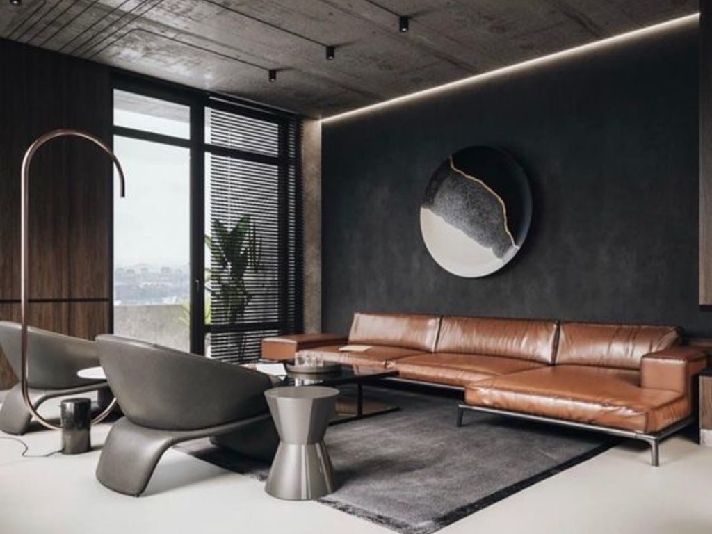 Гостиная в брутальным стиле: стены покрыты микробетоном