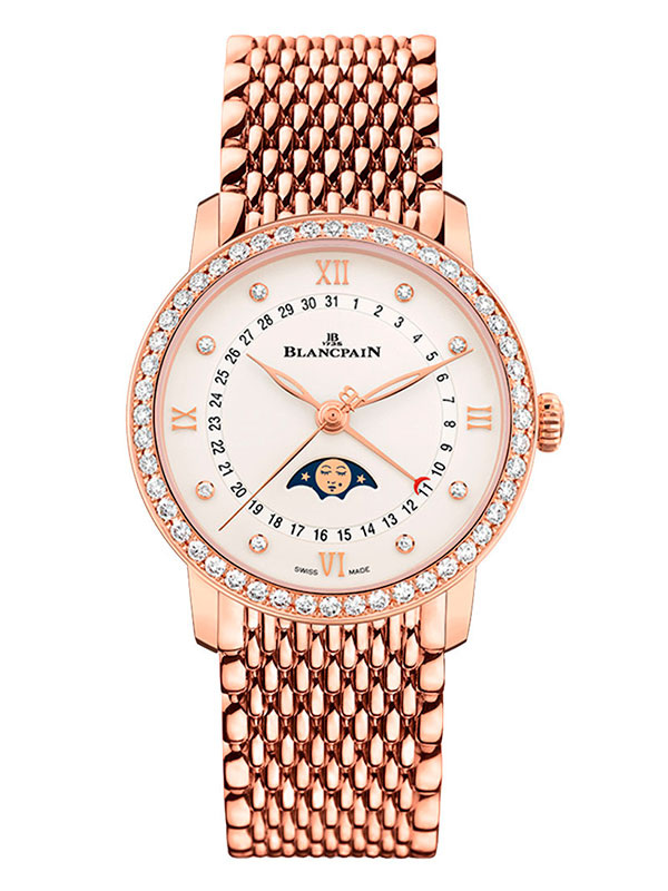Часы Blancpain Villeret Quantième Phases de Lune в 33.2 мм корпусе из розового золота с бриллиантами по безелю и бриллиантами метками. Оснащены указателем даты и календарем лунных фаз