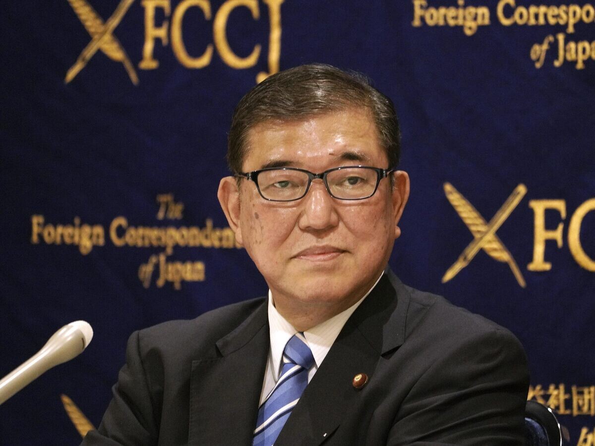    Член Палаты представителей от Либерально-демократической партии Сигэру Исиба© AP Photo / Eugene Hoshiko