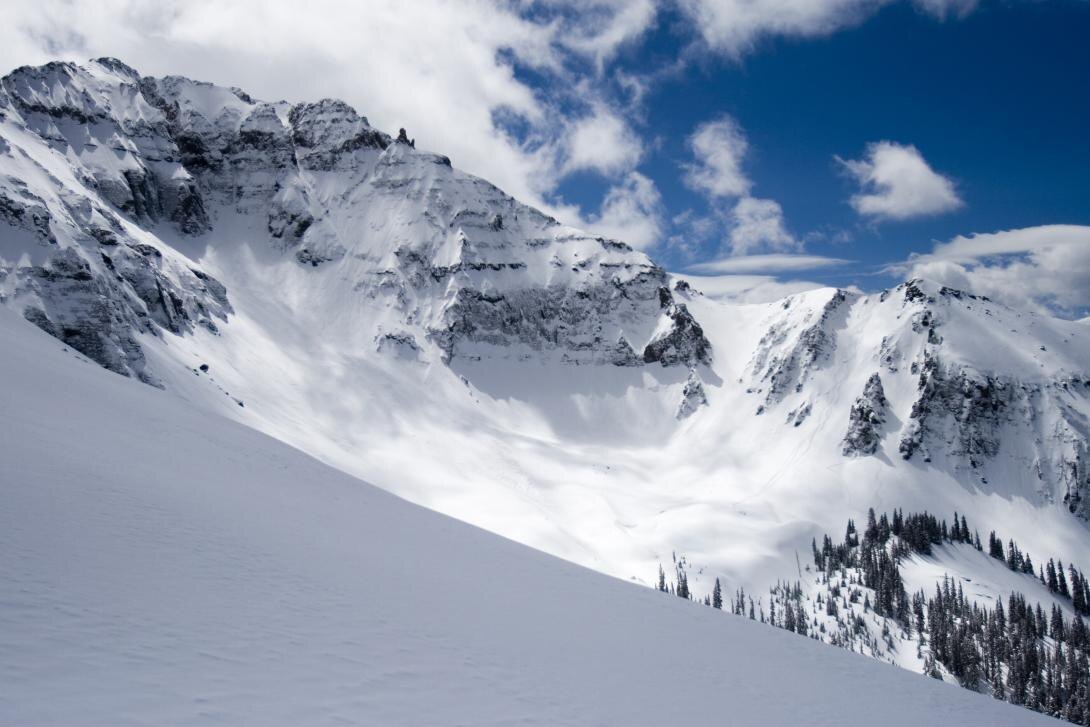 A snow avalanche is usually a large mass of snow sliding down a hill or a mountain. They can be occurred naturally (after heavy rains, winds, storms and snowfalls) or by humans: skiing, snowmobiling and mountain hiking can cause them. 