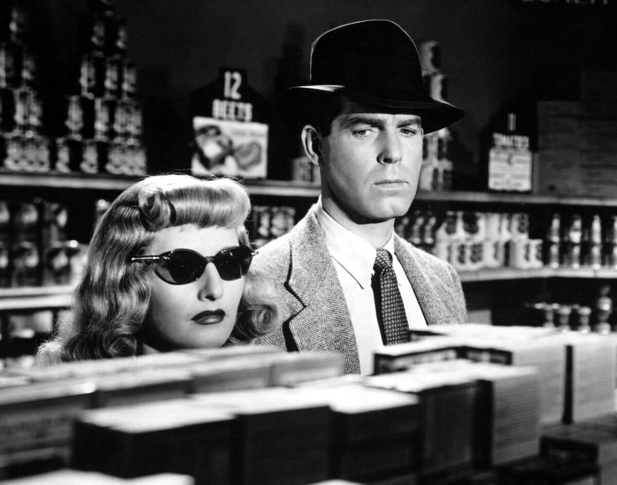 Актриса Барбара Стэнвик и актер Фред Макмюррей в фильме режиссера Билли Уайлдера «Двойная страховка» (Double Indemnity)
