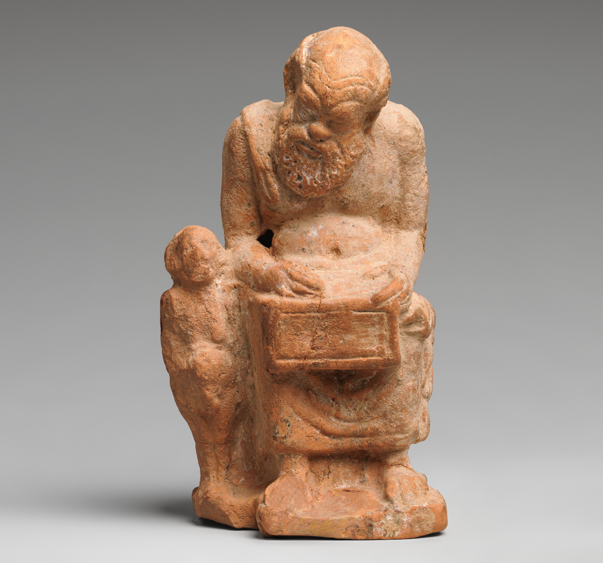 Терракотовая статуэтка пожилого учителя и ученика. Кон. IV-нач. III вв. до н.э. Малая Азия. Метрополитен музей, Нью-Йорк.
